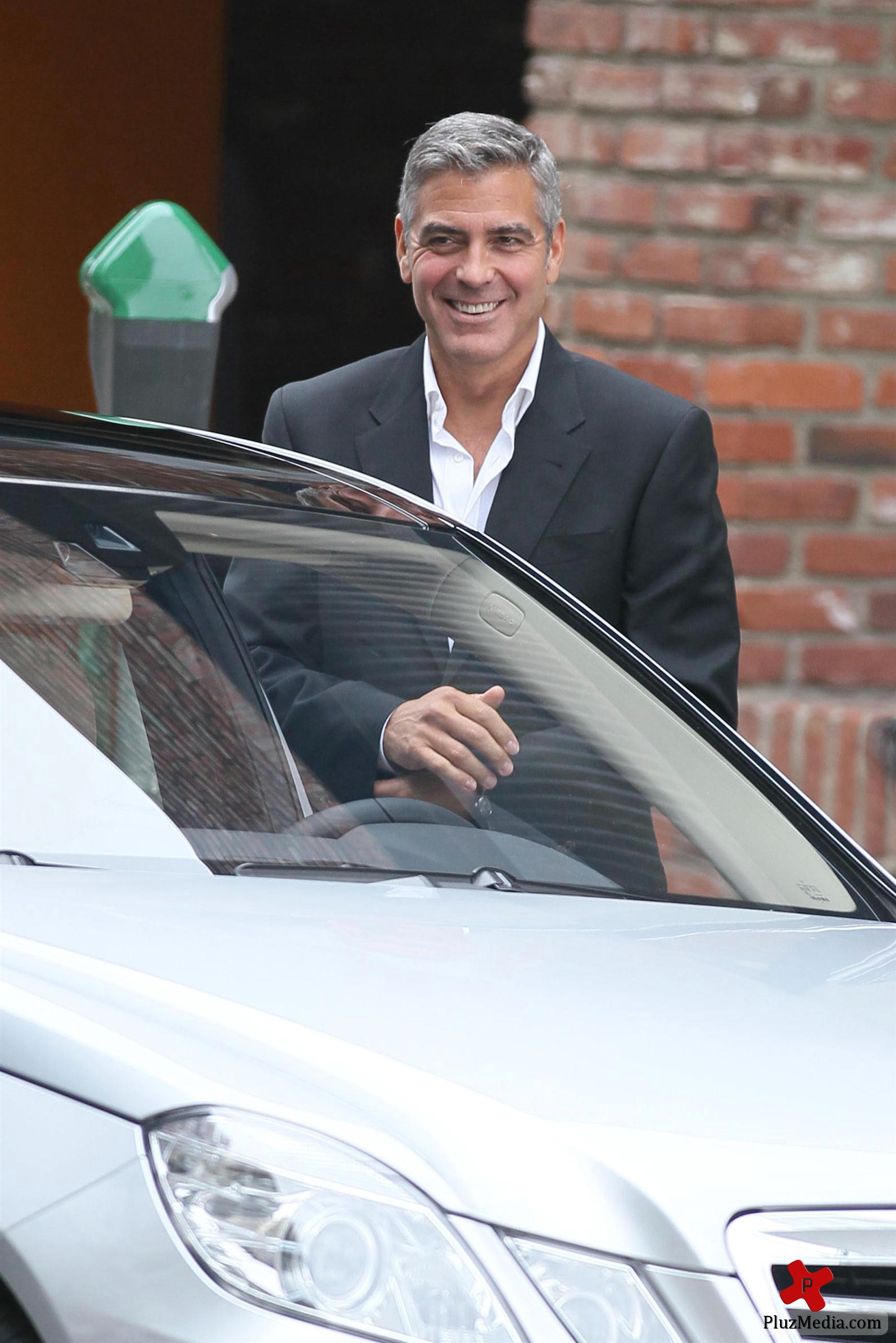 George Clooney on the set of a Mercedes Benz E300 L advert photos | Picture 78297